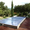 Cubierta extraplana para piscina modelo 8 de 12 x 6 motorizada